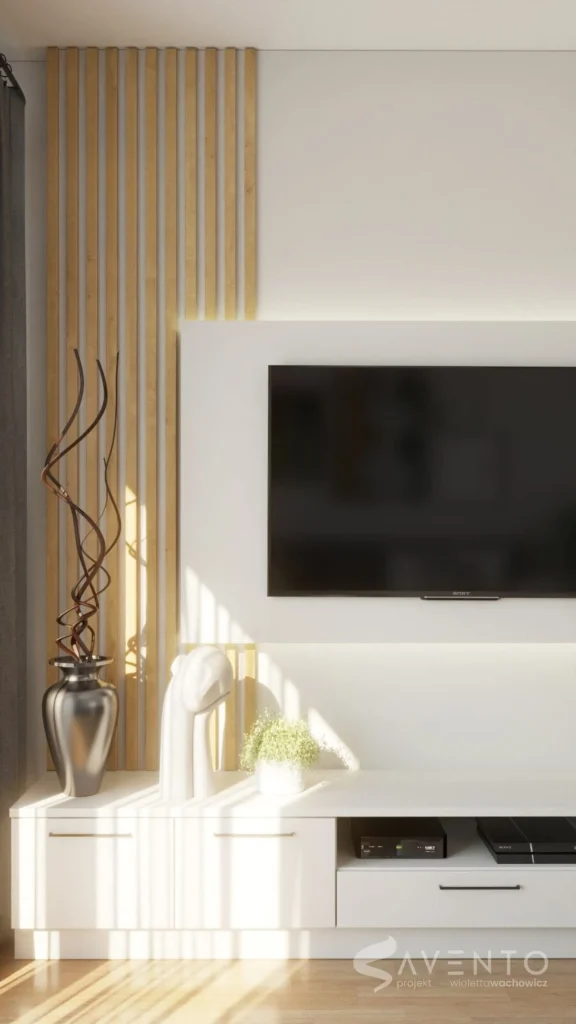 Zabudowa medialna z szarego mdf. Telewizor na płycie oddalonej od ściany z podświetleniem LED. Projekt Savento