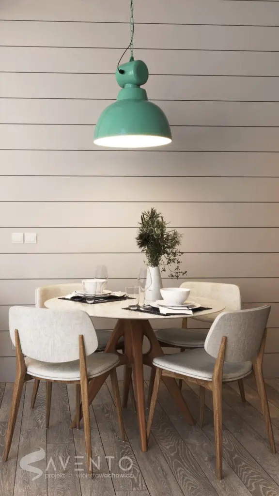 Stół z krzesłami w aneksie kuchennym. Projekt Savento